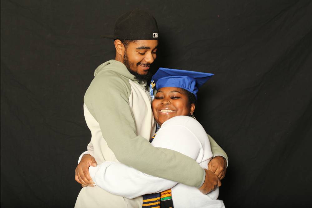 two people hugging for gradfest photo